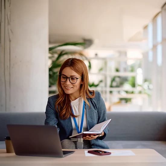 Finance approver reviewing an invoice approval on a laptop