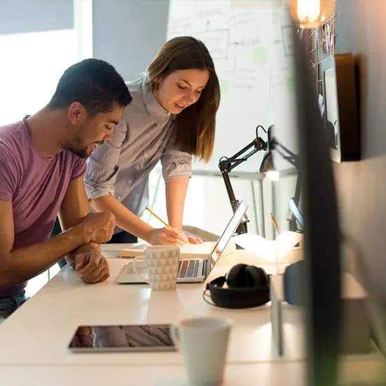 Asset management team reviewing fund information together at a desk