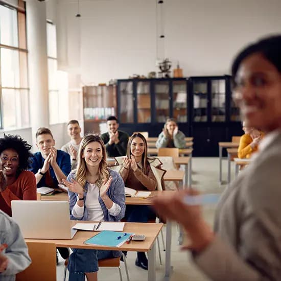 Students and teacher in a bright classroom during a lesson