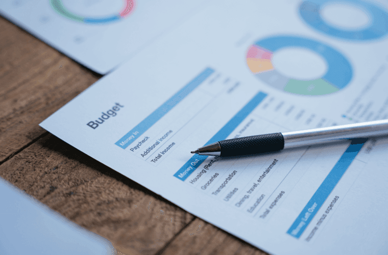 Colorful business documents with icons representing accounts payable and spend management processes