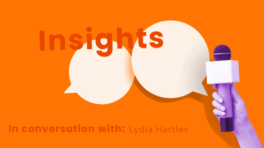 Bright orange graphic with speech bubbles, the word "Insights," and a hand holding a microphone. Text reads, "In conversation with: Lydia Hartles.